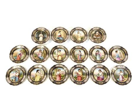 Vienna porcelain sixteen piece dessert service, comprising twelve plates (one repaired) and four comports, each piece painted