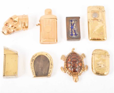 Eight brass vesta cases, Bull dog opening mouth, 5.5cm, flask, log cabin toilet, Japanese with geisha and compass, turtle, ho