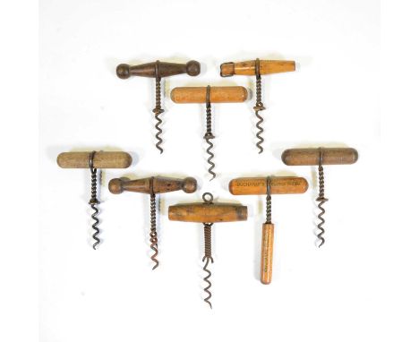 Eight twisted wire corkscrews, turned wooden handles, three advertising including Buchanan's Scotch Whisky, Schweppes, Brooke