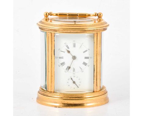 French brass oval carriage clock, white enamelled dial, repeating alarm movement, striking on a gong, 14cm.