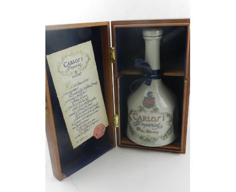 Lladro, Spain. A porcelain brandy bottle, filled and sealed, in original box.