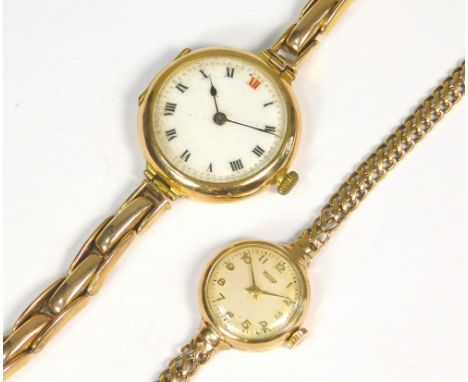 GOLD WATCHES. A lady's 9ct. gold cased Tissot wristwatch on 9ct. gold fancy link strap. Also one other gold cased wristwatch 