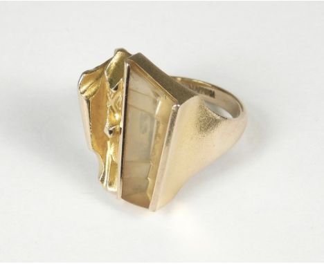 LAPPONIA. A 14ct. gold &amp; citrine dress ring for Lapponia. This 'Prisma' design by Bjorn Weckstrom with the citrine cut by