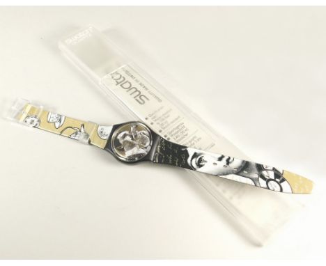 SWATCH. A Swatch quartz watch with Fornasetti dial & strap, apparently unworn. Original case & leaflet.Important Note: All wa