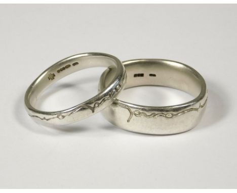 DIANA PORTER. Two of Diana Porter's 'on and on' silver rings. (T/U &amp; S/T).