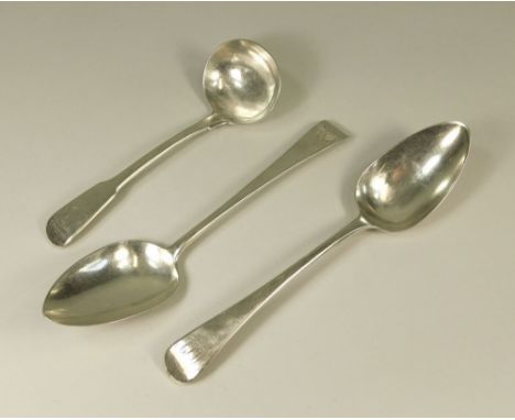 SILVER SPOONS.A George III sauce ladle with armorial crest, London 1811 & two dissimilar Georgian tablespoons. Approx. 6.2 t.