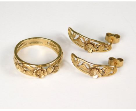 GOLD RING ETC. A 9ct. gold handmade ring of flower &amp; leaf design (O) &amp; a pair of matching earrings. Approx. 4.8g.