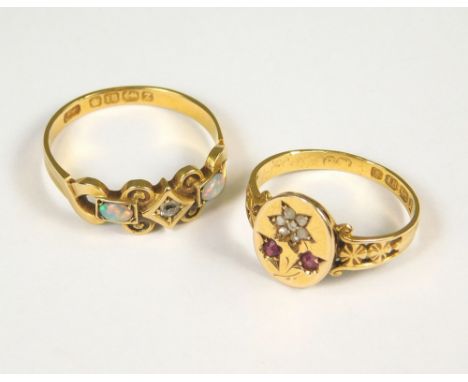 GOLD RINGS. A Victorian 18ct. gold ruby &amp; diamond flower head ring (L), Birmingham 1891. Also an 18ct. gold diamond &amp;