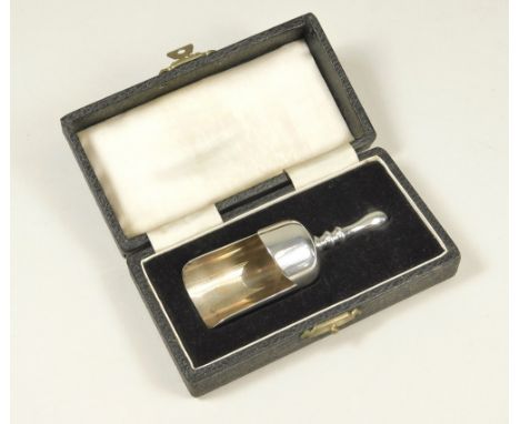 CADDY SPOON. A novelty caddy spoon in the form of a flour scoop. Birmingham 1954. Cased.