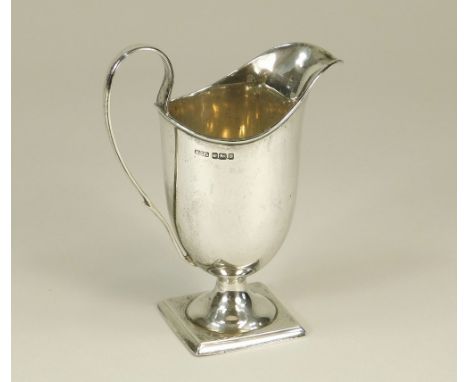 CREAM JUG. An Edwardian silver helmet cream jug. Sheffield 1906. Approx. 4.4 t.oz.