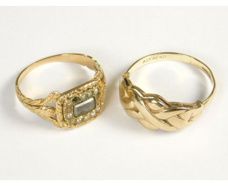 GOLD RINGS. A 19th century mourning ring, set a hair compartment within a half-pearl border (four pearls missing). Also a 9ct