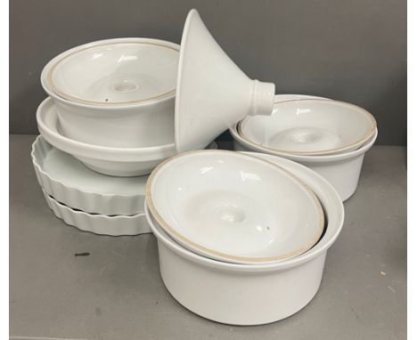 A selection of white ceramic cookware 