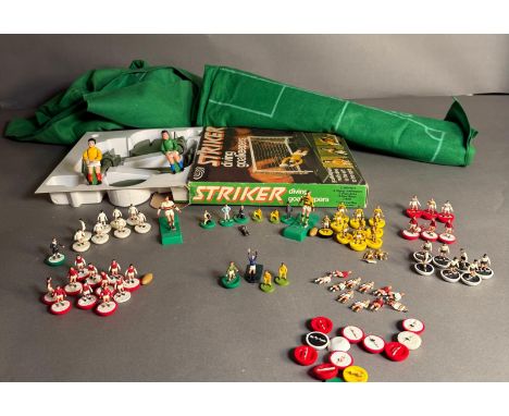 A vintage selection of flick table football and rugby players and a boxed "Striker diving goalkeepers set"