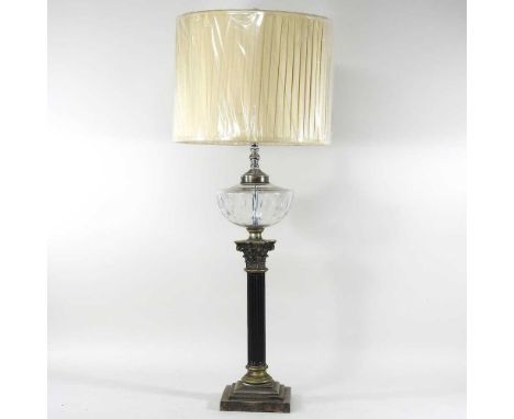 A brass table lamp, in the form of a Corinthian column, with a silk shade, 81cm high