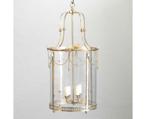 A large brass hanging lantern, with glazed panels, 84cm high