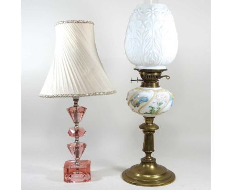 A pink glass table lamp and shade, together with a brass oil lamp, with a white opaque shade, 60cm high (2)