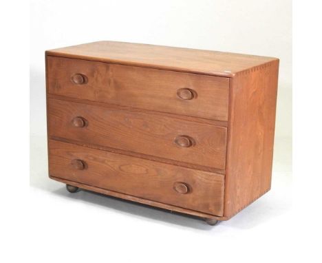A 1970's Ercol elm Windsor chest of drawers92w x 49d x 66h cmOverall condition is complete, but dry and dirty, with various l