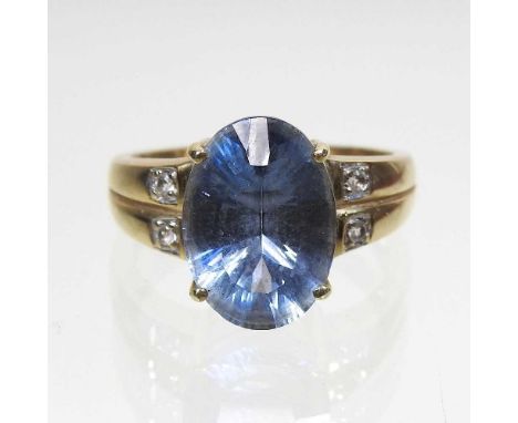 A topaz and quartz dress ring, marks rubbed, size R, 5.4g, boxed