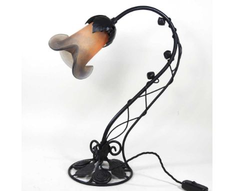 An Art Nouveau style table lamp, modern, with a glass shade, 50cm high