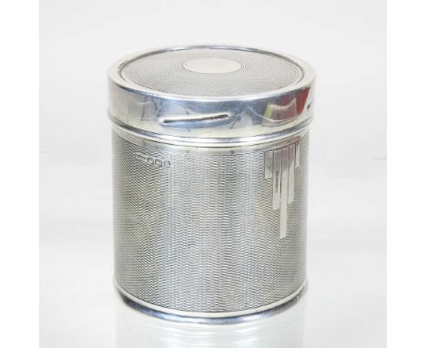 An early 20th century silver jar and cover, with engine turned decoration, by Mappin &amp; Webb, Sheffield 1934, 107g, 8.5cm 