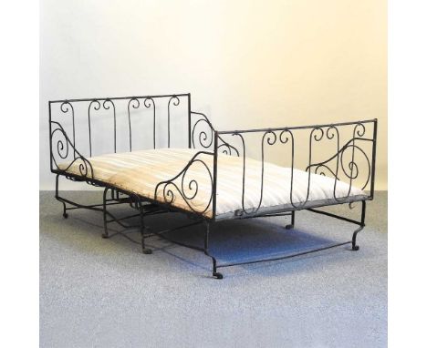 A vintage French wrought iron folding daybed186w x 110d x 78h cm