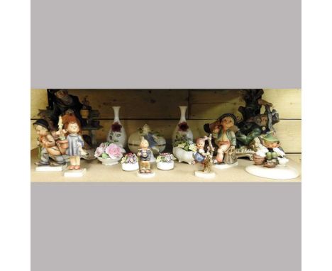 Two Capo di Monte figures, together with various porcelain flower ornaments and Hummel figures