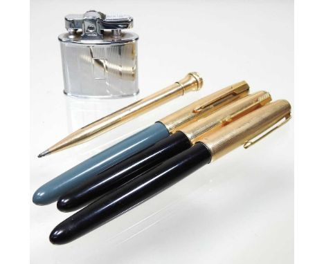 A Parker 51 fountain pen, in black with a gold plated cover, stamped made in USA, together with another, a grey Parker 51, a 