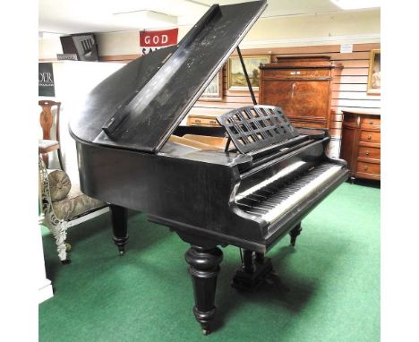 An early 20th century German baby grand piano, in an ebonised case, by Robert Westphal, Berlin, 140cm long. Note: a non-trans