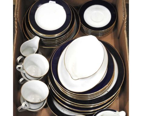 A Noritake porcelain part tea and dinner service, with blue and gilt borders