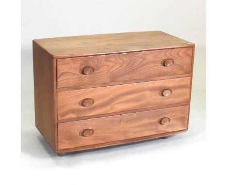 A 1970's Ercol Windsor elm chest of drawers92w x 49d x 66h cmOverall complete and usable. Drawers are tight to close and do n