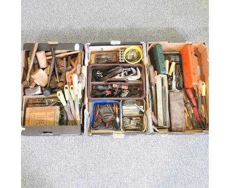 A collection of vintage hand tools and workshop tools