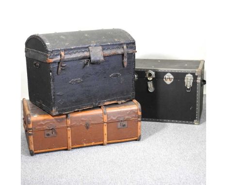 A 19th century dome top trunk, 76cm wide together with two various travelling trunks (3)
