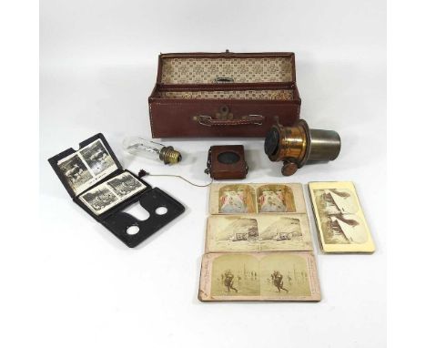 A stereoscopic viewer, together with a collection of magic lantern slides