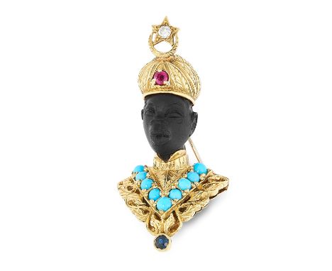 A GEMSET HARDSTONE BLACKAMOOR BROOCH comprising of a carved hardstone face and jewelled with round cut diamond, ruby and cabo