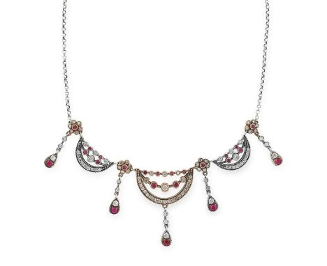 A RUBY AND WHITE GEMSTONE SWAG NECKLACE set with round mixed cut rubies and round mixed cut white gemstones, 45cm, 20.7g.