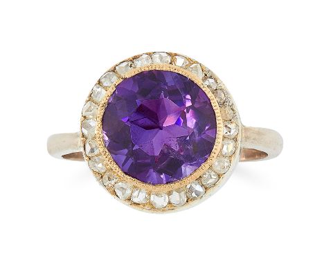 AN AMETHYST AND DIAMOND CLUSTER RING set with a central round cut amethyst of 2.75 carats, encircled by rose cut diamonds, te