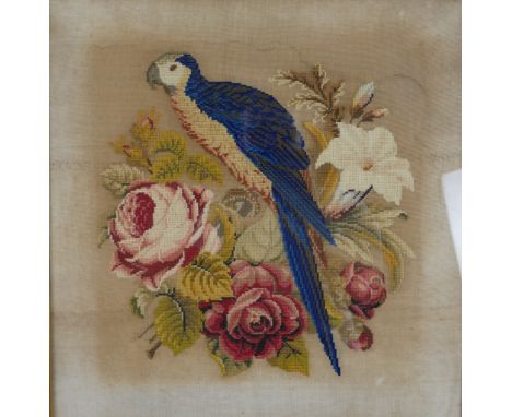 A late 19th century needlepoint tapestry panel of parrot in a rose bush, framed. H.58 W.57cm. 