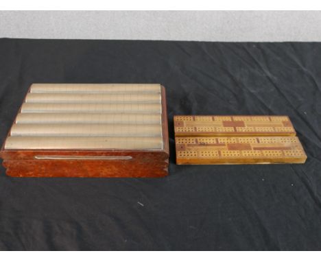 A mid 20th century mahogany cased poker set, together with two cribbage boards, H.7 W.28 D.19.5cm Largest 