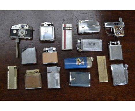 A large collection of vintage lighters; camera; pistols; Ronson; etc.