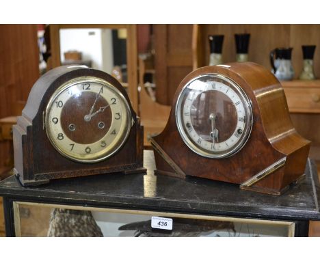 A mid 20th century walnut cased English mantel clock, and another oak cased mantel clock.