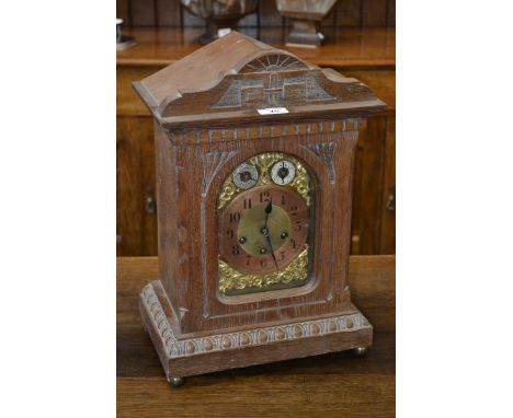 A bracket clock, Junghans B08, oak case, brass face, Arabic numerals to chapter ring, two subsidiary dials chime/silent & slo