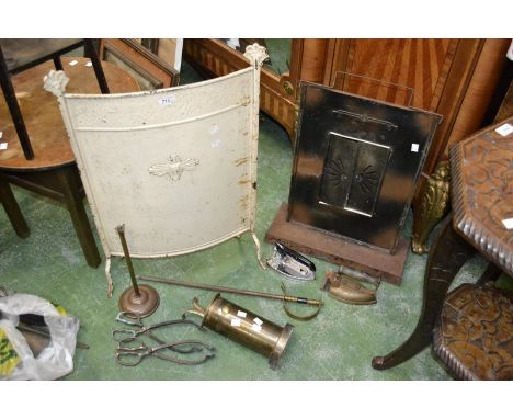An Art Deco portable meter electrical heater; a conforming firescreen; companion set etc.