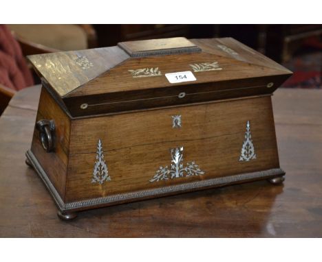 A Victorian rosewood sarcophagus tea caddy, inlaid throughout with mother of pearl, bun feet, c. 1860