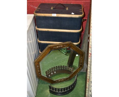 A mid 20th century bent beechwood bound travel trunk; an oak framed mirror, bevel edge glass; a cast iron fireguard (3)