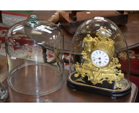 A 19th century gilt metal mantel clock under dome, c.1870; a dome (2)