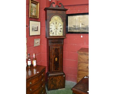 A George III flame mahogany eight day longcase clock, with two subsidiary dials