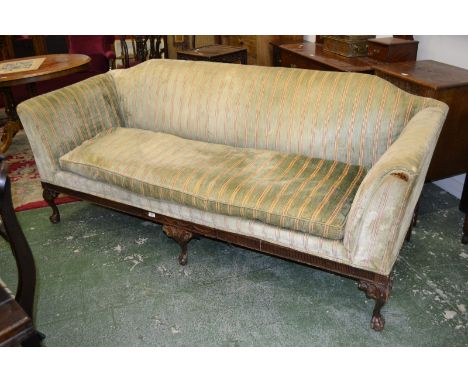 A large sofa, shaped back, squab cushion, carved cabriole forelegs, ball and claw feet, early 20th century