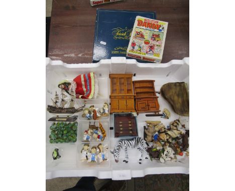 Dolls house furniture, marbles, plastic animals, Dandy playing cards and Trivial Pursuit&nbsp;