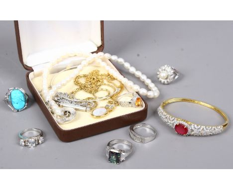 A box of dress jewellery including a carved turquoise cameo ring, opal pendant and freshwater pearls etc.