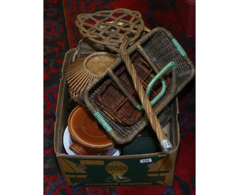 A box of kitchenalia candlesticks to include rug beater, shoe stretchers, pair of wooden Barleytwist candlesticks, trench art